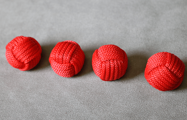 Monkey Fist Cups and Balls (4 Balls) by Leo Smetsters - Trick