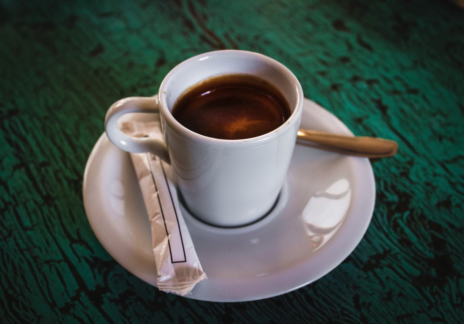 white coffee cup on saucer