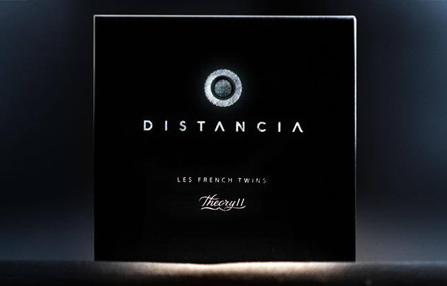 Distancia (Half Dollar) by Les French Twins